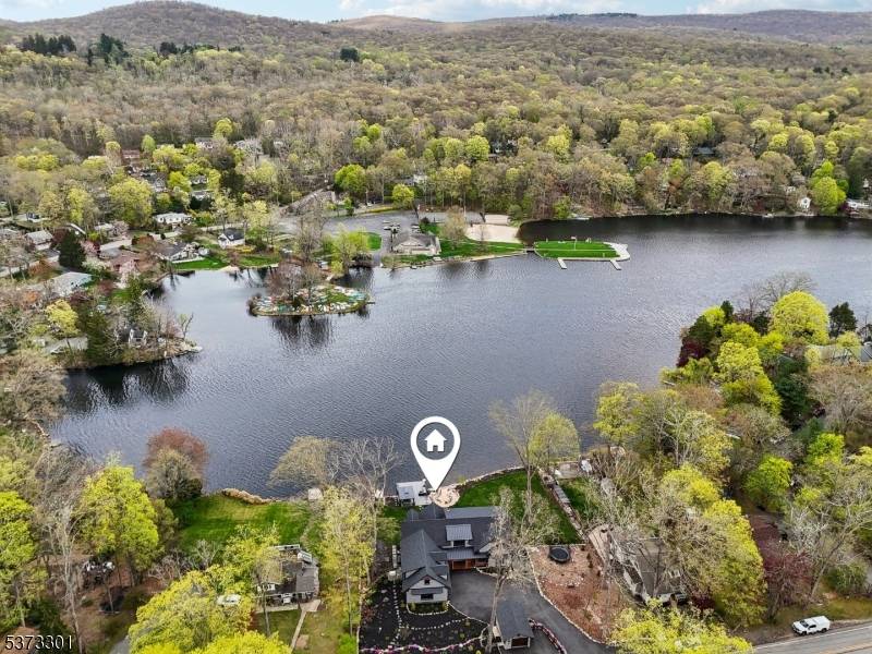 Welcome to your dream lakefront retreat, just 29 miles from New York City.