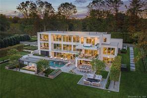 Awaken to spectacular sunrises over Long Island Sound at Westport's ultimate modern waterfront estate !