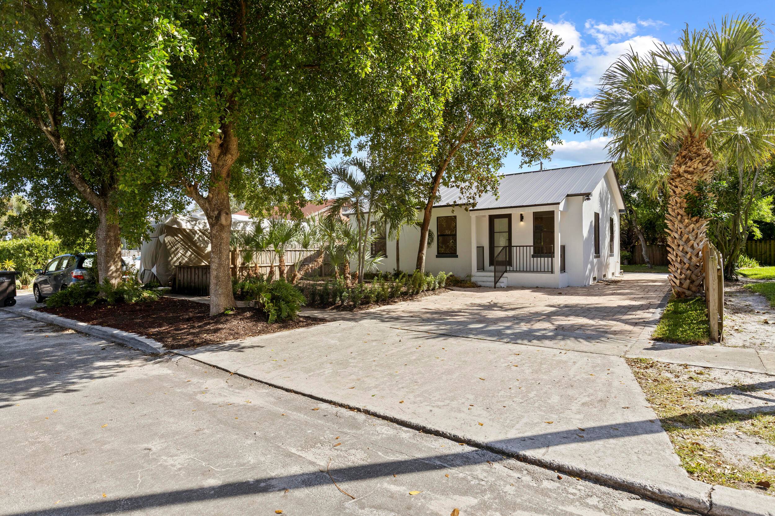 Remodeled 4 bedroom 2 bathroom, all new plumbing, electrical, roof, impact windows.