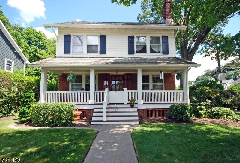 Classic Colonial with Farmhouse flair on a desirable corner lot !