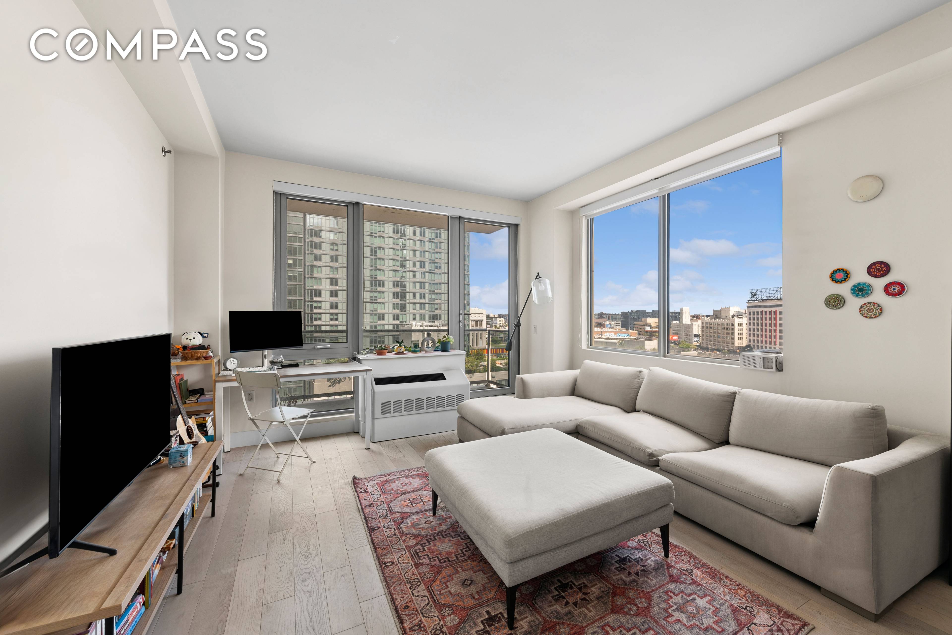 Spacious Corner Residence with Private Balcony High Ceilings Tax Abatement Until 2029 Welcome to Residence 15C at The Vista Condominium, a beautifully designed one bedroom, one bathroom corner home offering ...