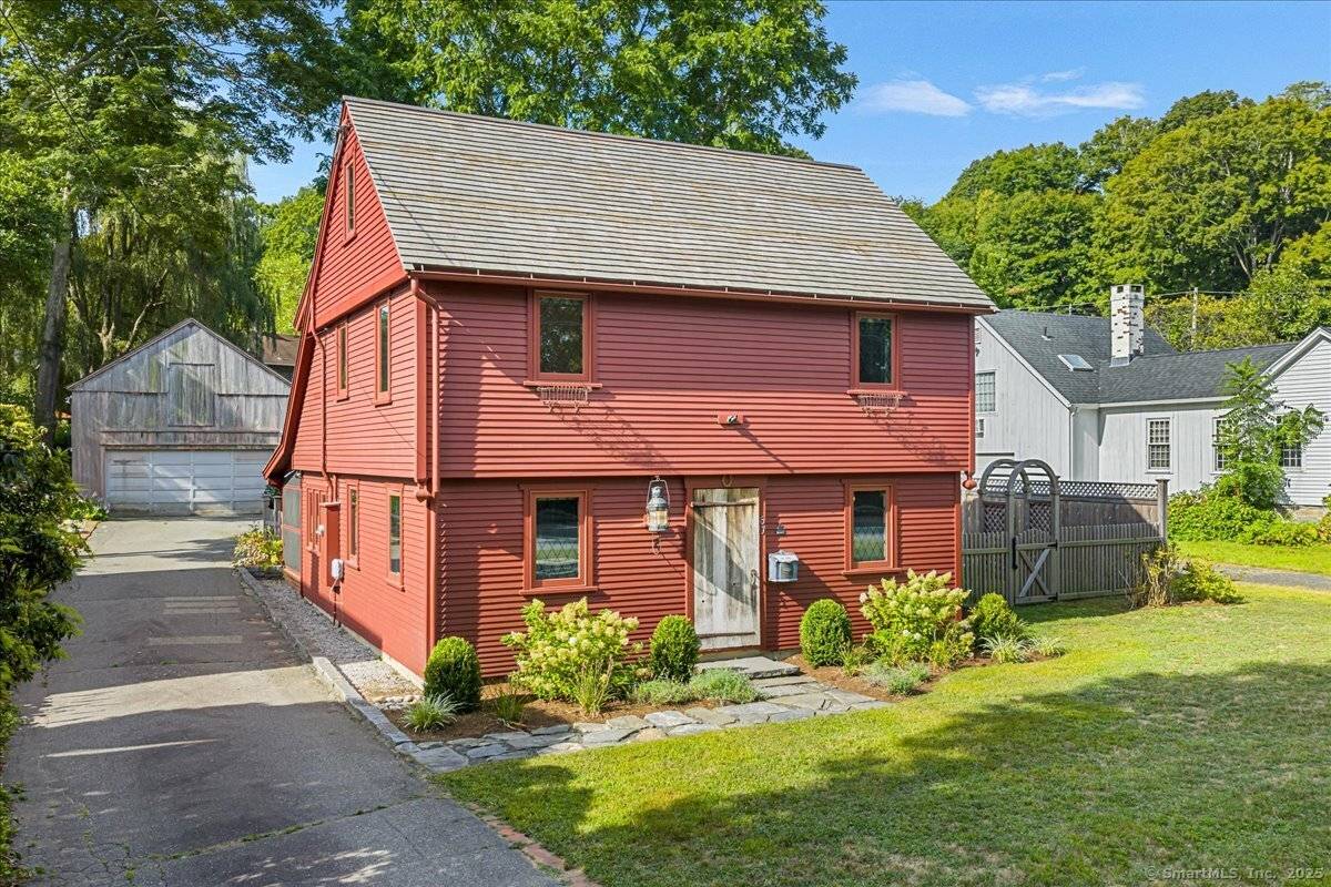 Sweet reproduction Saltbox Colonial in Essex Village.