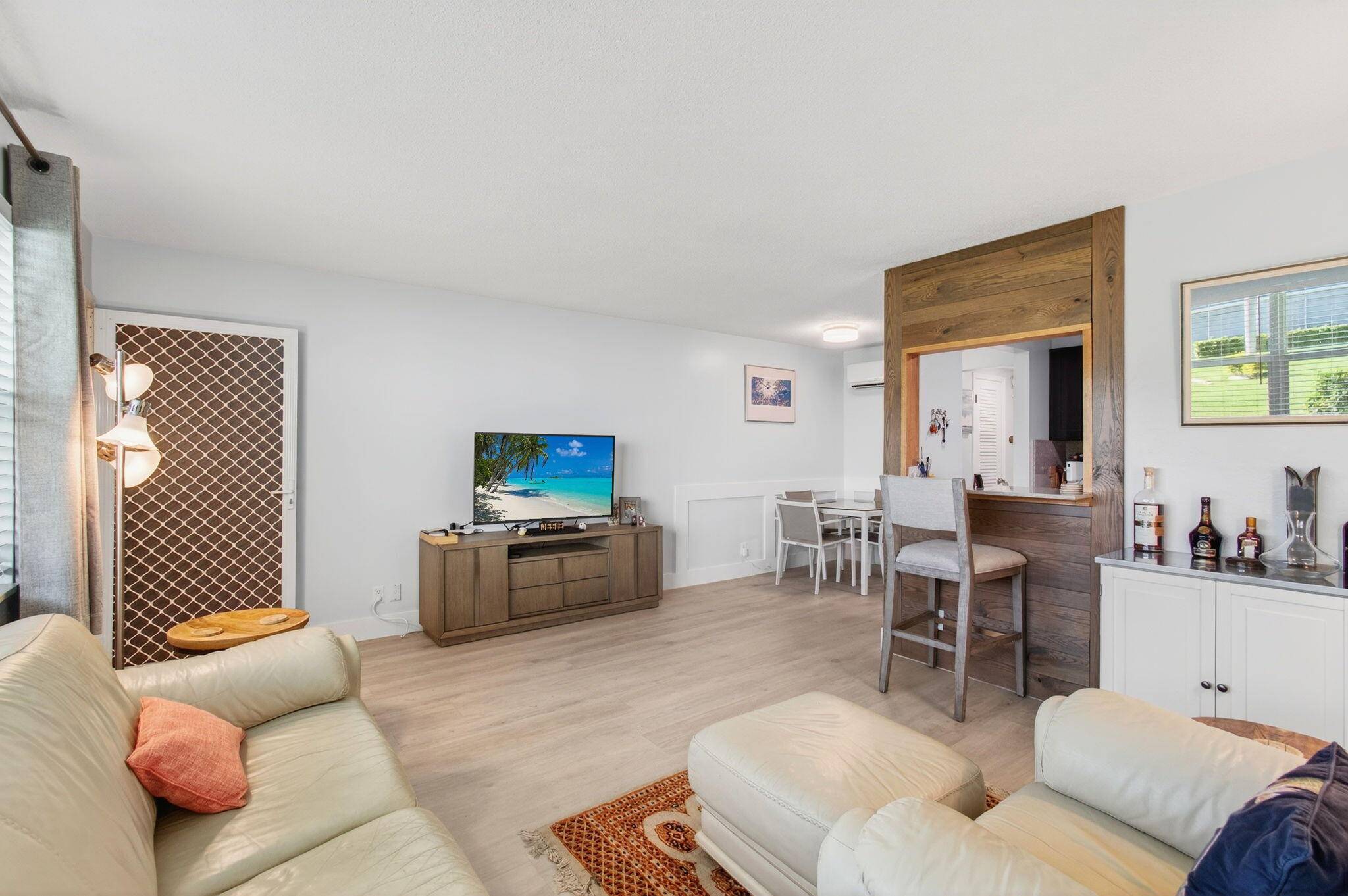 Experience everyday beauty in this turnkey, ground floor condo, available fully furnished or unfurnished.
