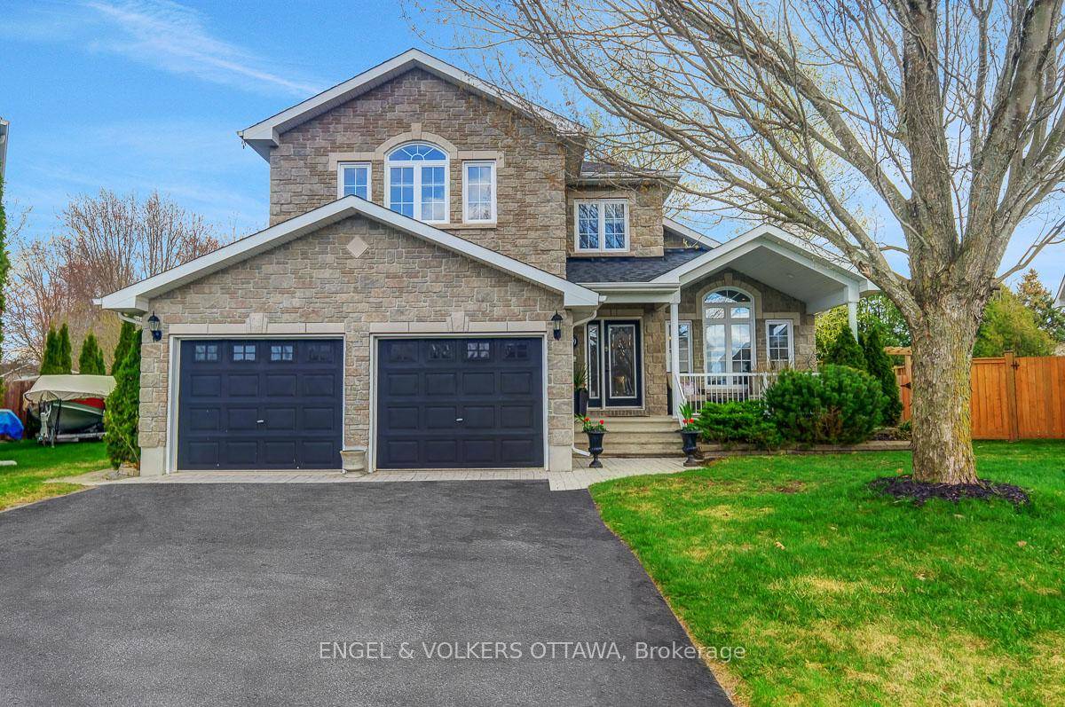 Welcome to 59 Frontenac Blvd, an exceptionally crafted home by Melanie Construction, located on a premium pie shaped lot.