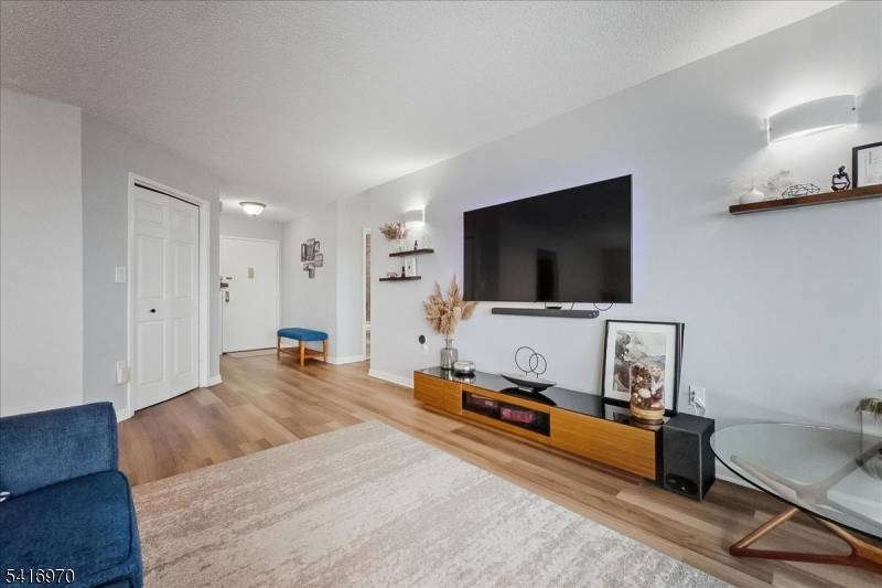 Spacious 2BR 2BA simplex with river views in desirable Harmon Cove Towers in Secaucus.