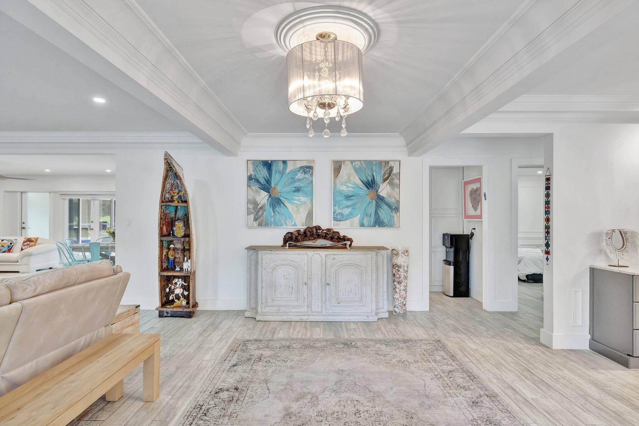 The perfect blend of elegance modern living in this exquisite 4 bed, 3 bath home, complete w bonus sunroom, offers unparalleled lake golf course views.