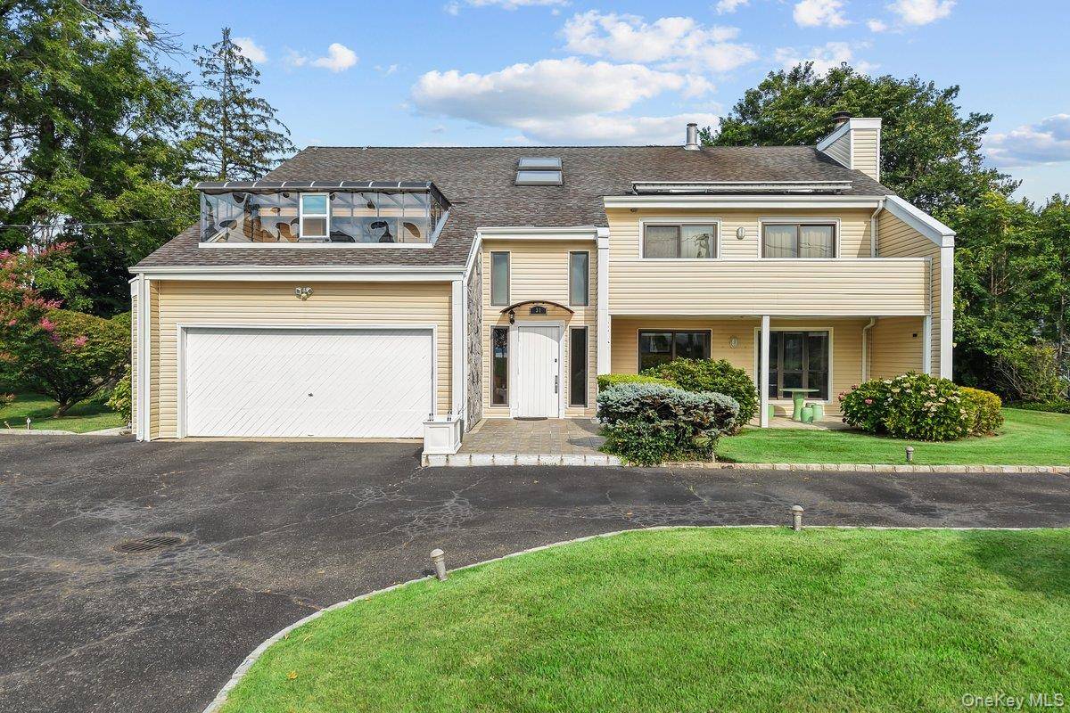 This lovely water view home in Glen Cove is in good, move in ready condition.