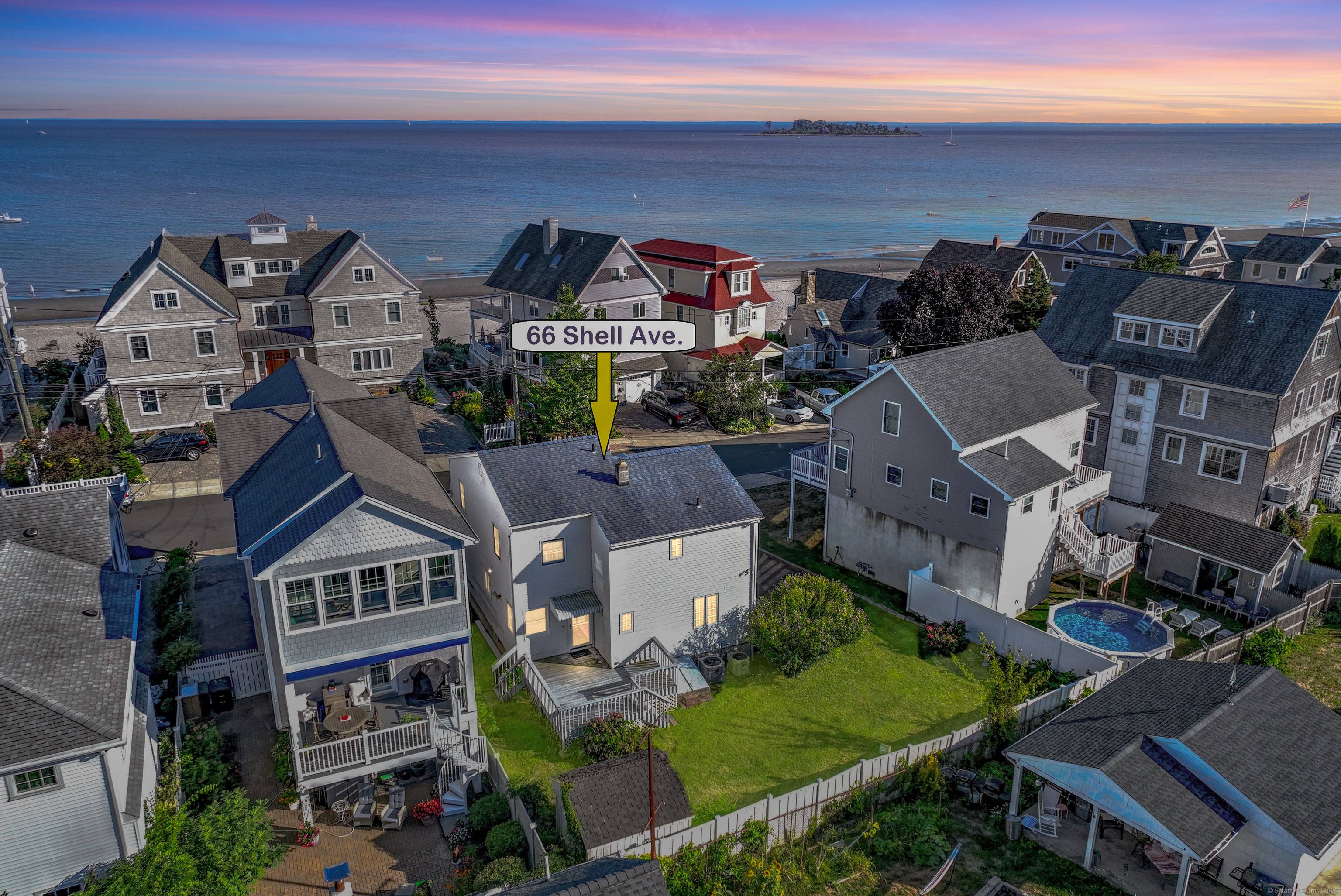 Bask by the beach in this breezy three bedroom retreat, where water views and waves lie right outside your window on one of Milford's treasured oceanside streets in the vibrant ...