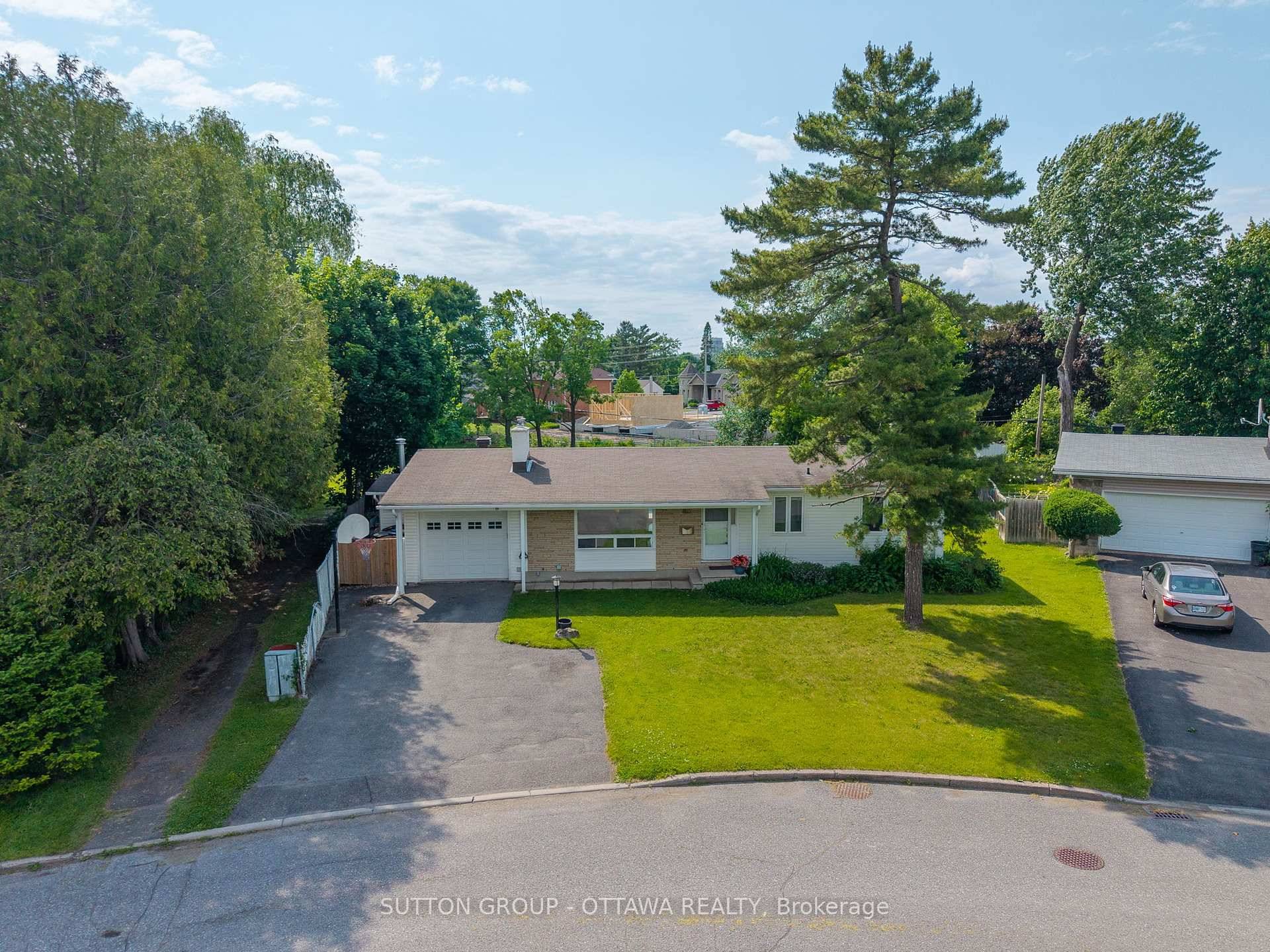 This charming bungalow offers rare privacy and park side living on an exceptional, oversized lot.