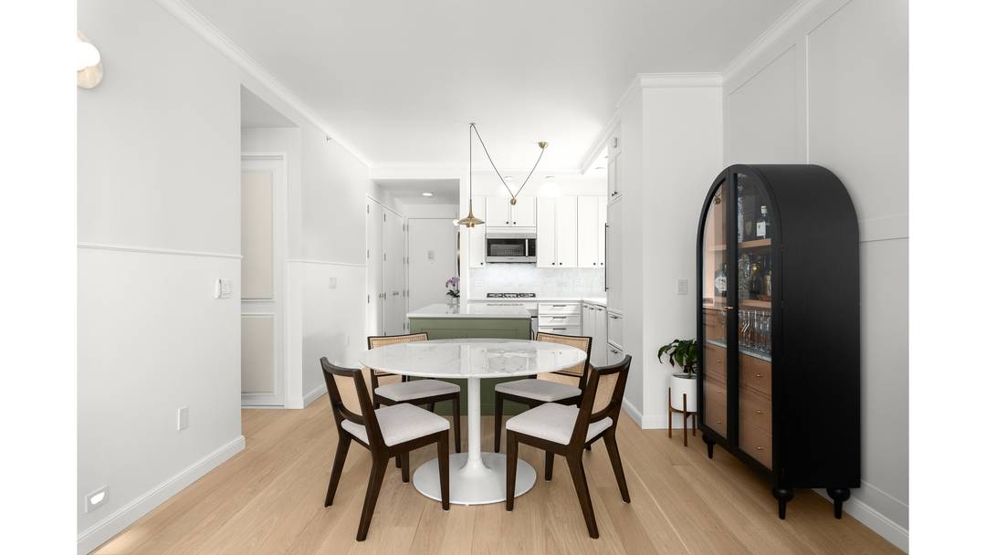 Located in the heart of Times Square, this beautifully renovated one bedroom residence with a home office at 1600 Broadway on the Square seamlessly blends modern luxury with thoughtful design.