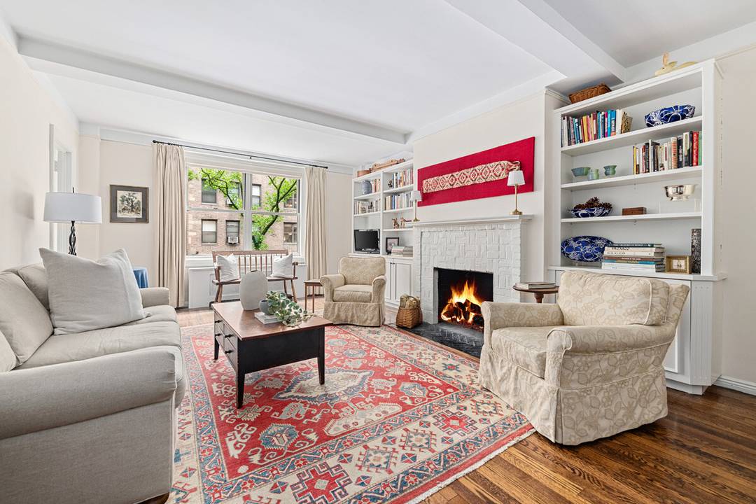 Move right in to this meticulously renovated south facing three bedroom, three bath home with wood burning fireplace just steps off Third Avenue on the Upper Eastside of Manhattan.