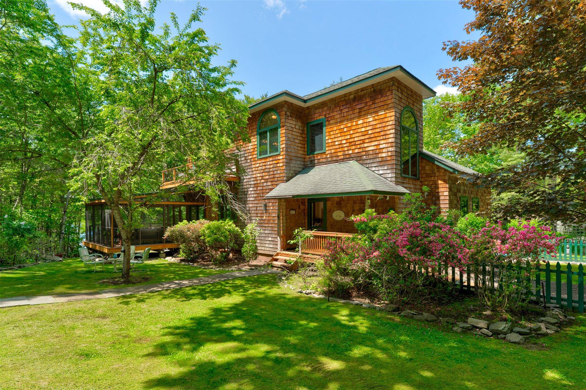 Amidst the towering hardwoods of York Lake Estates, where privacy meets pristine natural beauty, Lakehaven offers an extraordinary opportunity to own a legacy lakefront retreat unlike any other.