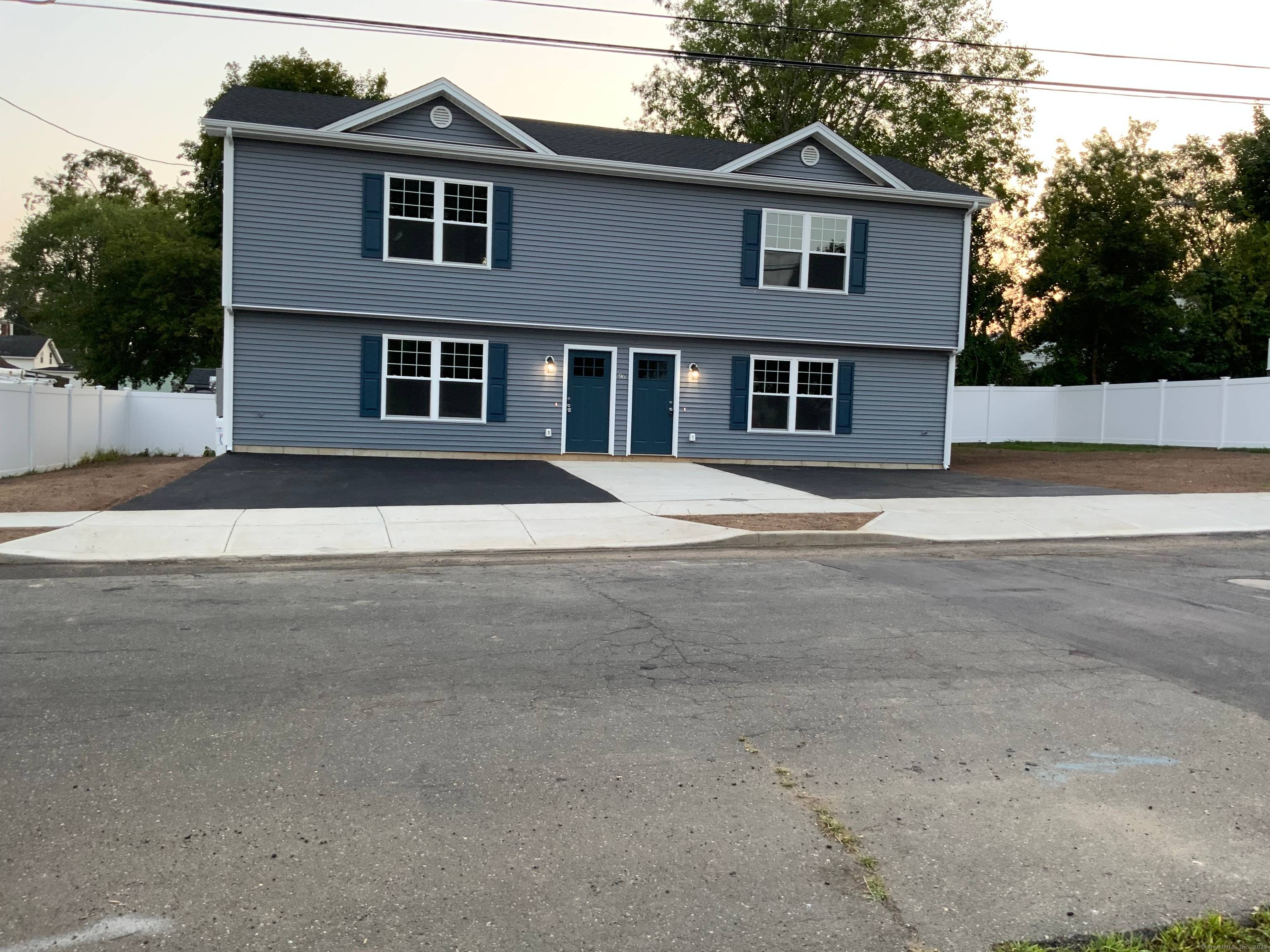Welcome to this spacious two family home new construction duplex 3 bedrooms 1 and half bathrooms.