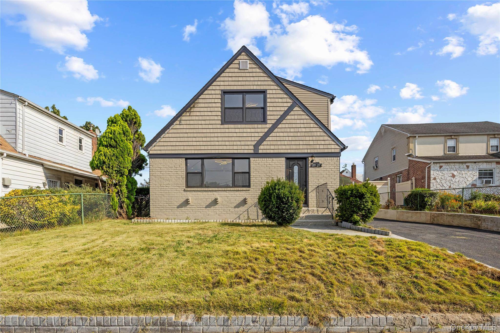 Move right into this stunning gut renovated home featuring a brand new kitchen, gleaming hardwood floors, and modern heating cooling system.