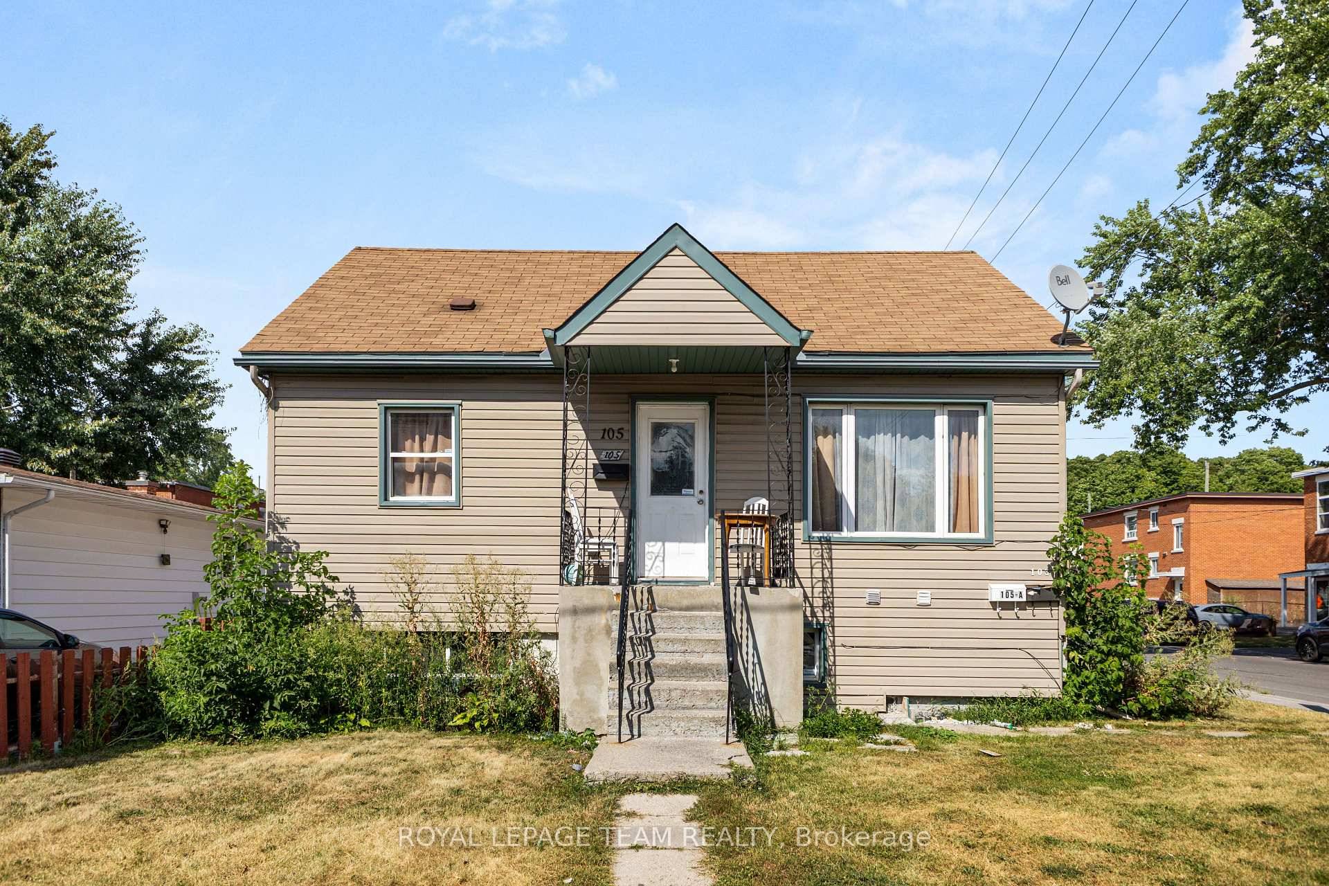 Welcome to 105 Jolliet Avenue A RENOVATED DUPLEX with a third non conforming unit, ideally located just steps from Beechwood Village.