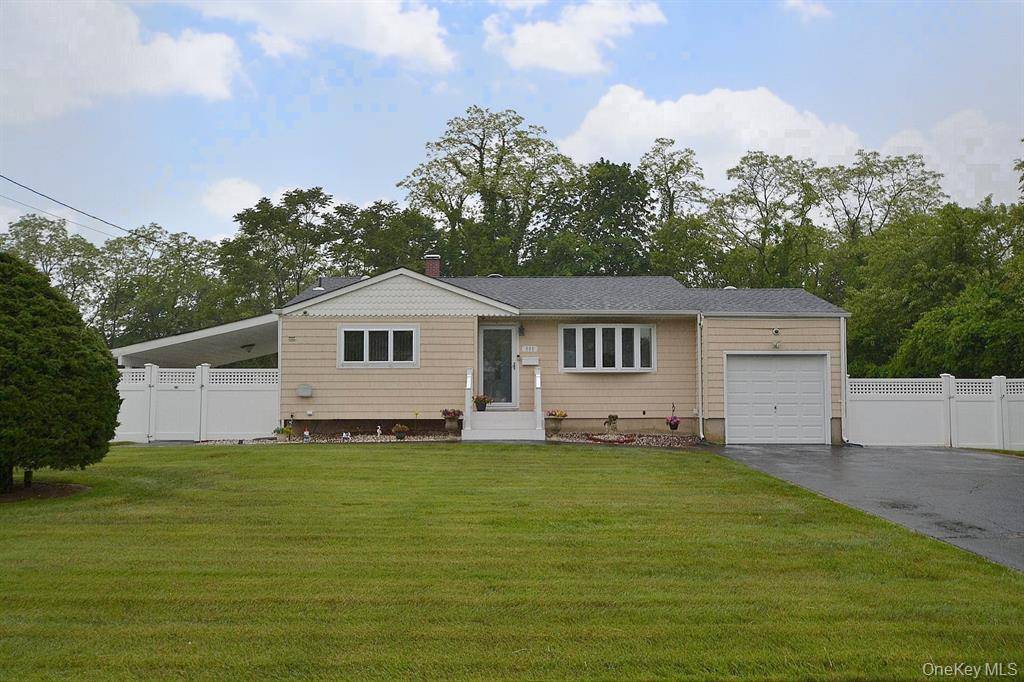 Mint 3 bedroom ranch with great curb appeal featuring a bright sunken formal living room den with vaulted ceilings that create an inviting atmosphere.