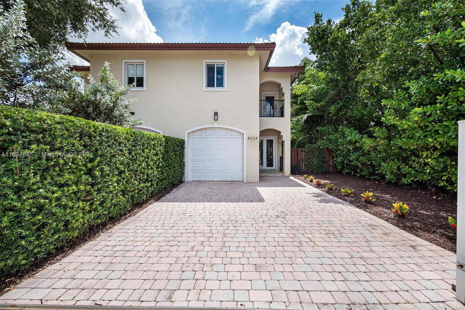 Luxury, privacy and value in this Little Gables townhome.