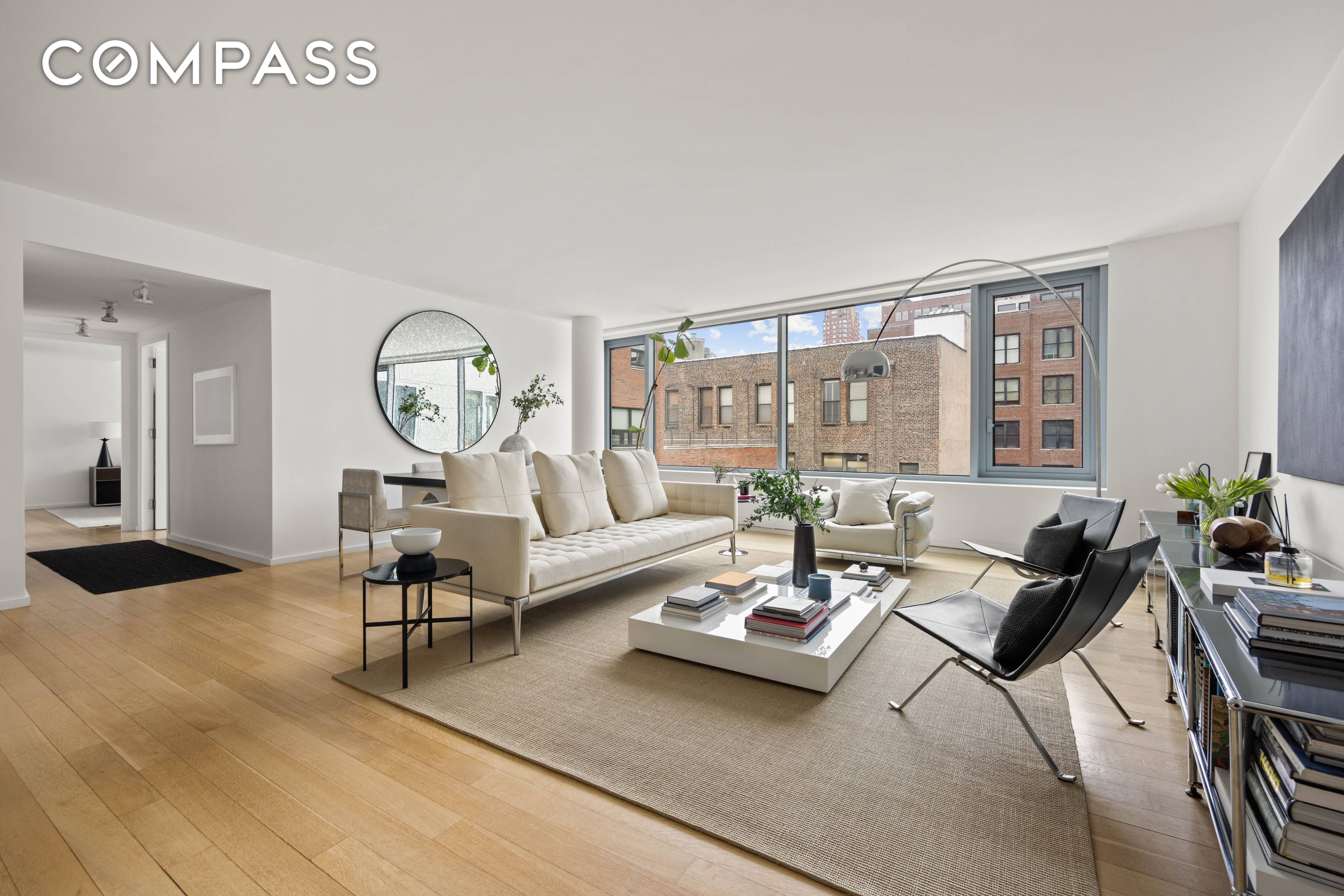 Discover the perfect blend of space, light, and luxury in this stunning top floor 2 bedroom, 2 bathroom condo at 425 West 53rd Street.