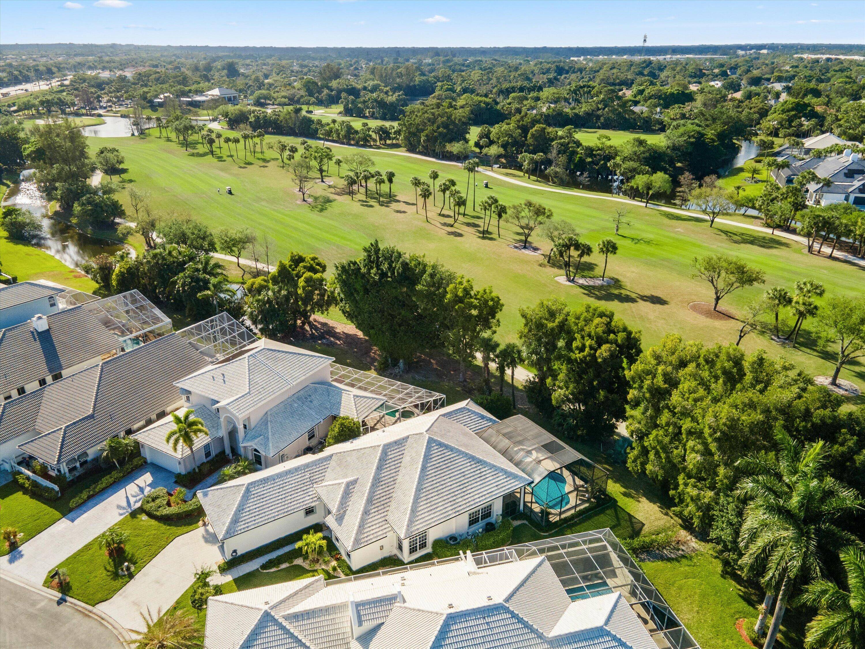 Beautiful home in West Palm Beach's Breakers West Country Club on private cul de sac street with just 15 homes overlooking 2 fairways of the prestigious Mayacoo Lakes Golf Course.