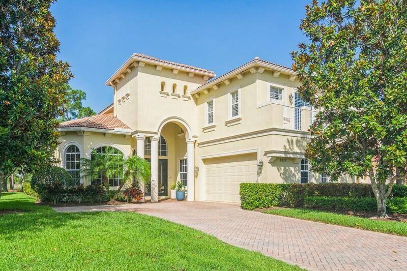 Stunning estate home nestled on the14th fairway of the Wannamaker course at PGA Village.