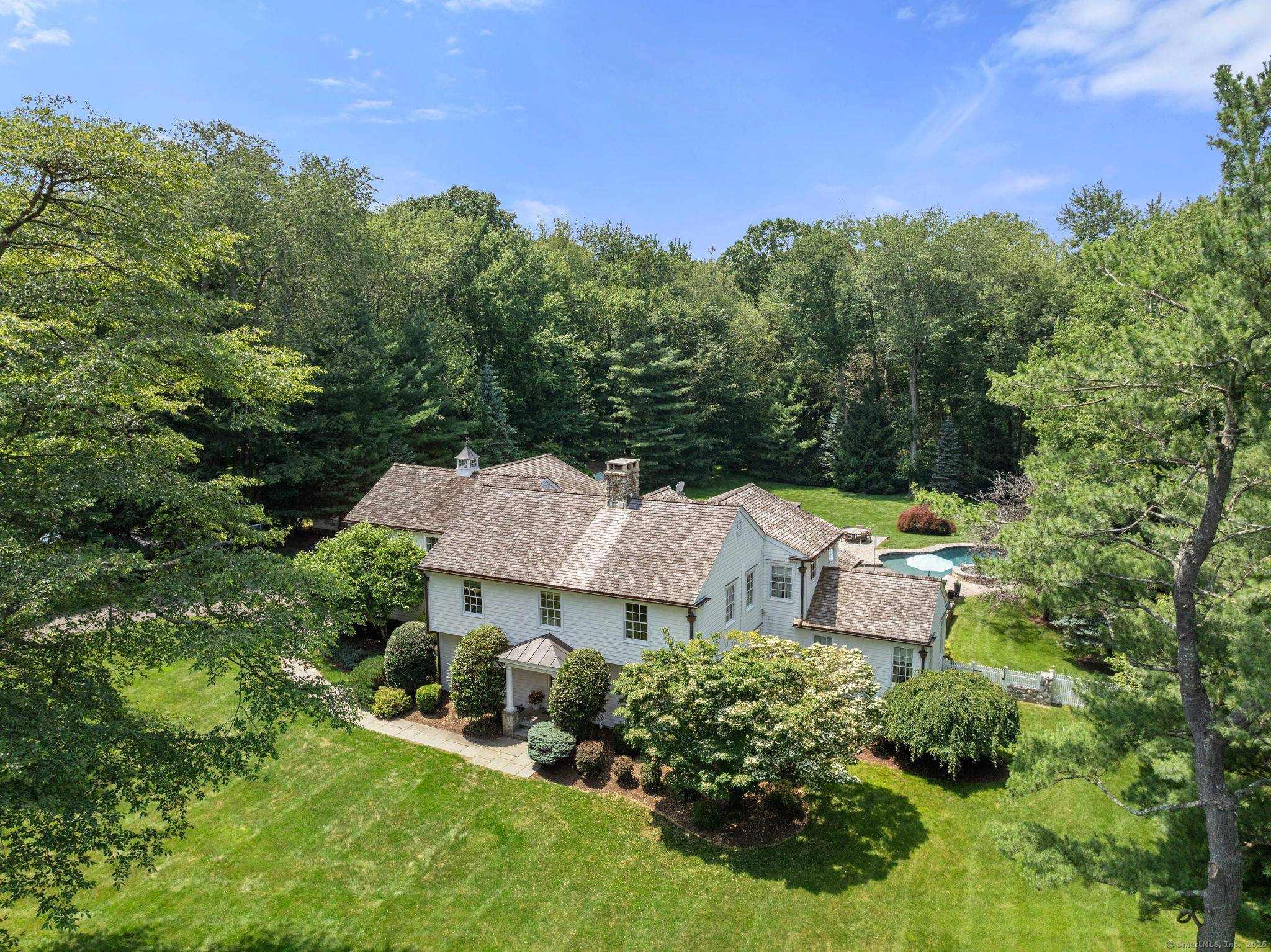 Perfectly sited on a quiet cul de sac in the Greenfield Hill neighborhood, this exquisite farmhouse style home offers over 5, 000 sq ft of elegant living space on a ...