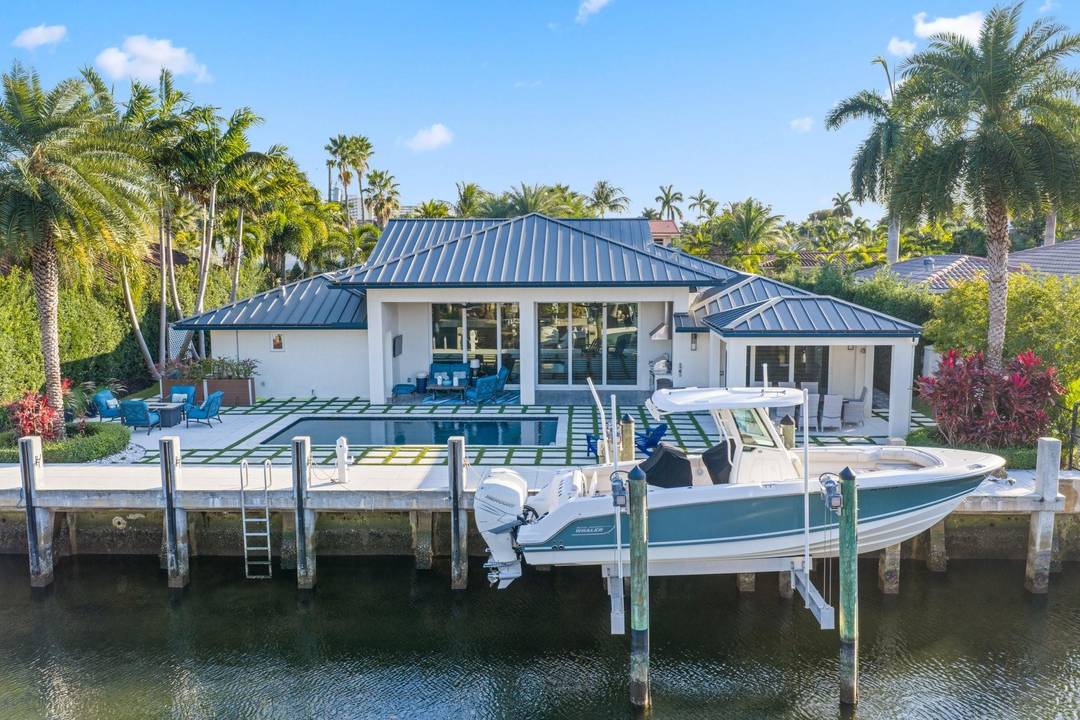 Premier, waterfront Coral Ridge Country Club home, expanded, fully remodeled and completed in 2018.