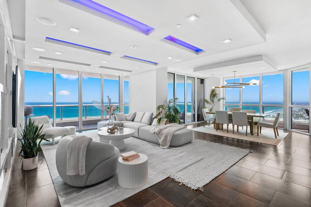 From the moment you step into your private elevator foyer, prepare to be captivated by the Breathtaking Panoramic Ocean, City, and Intracoastal Views of this redesigned SE corner Residence.