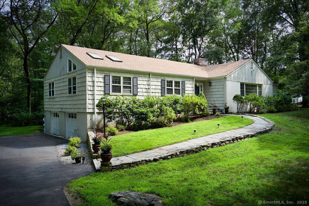 Updated Ranch in Desirable Foxwood Lake Association Nestled on 1.