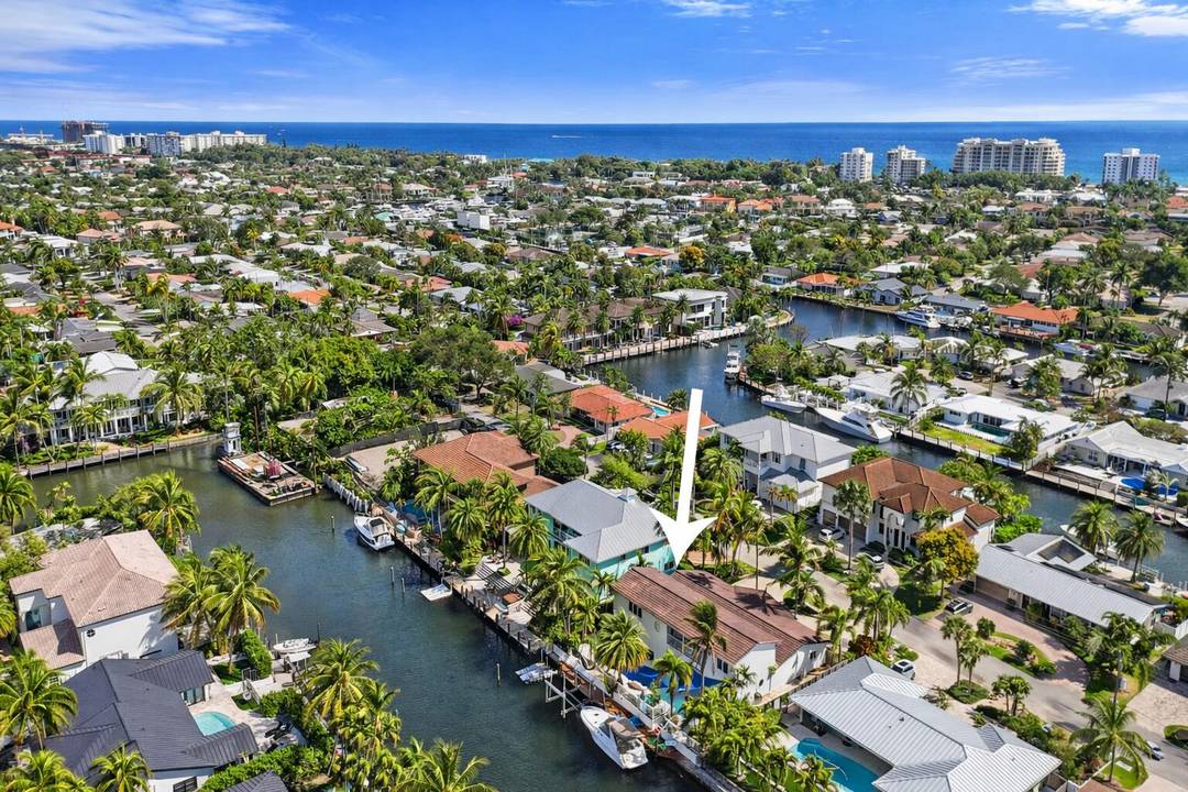 A rare opportunity and a true boater's dream with direct ocean access and no fixed bridges, this expansive two story waterfront residence offers over 4, 400 square feet of exceptional ...