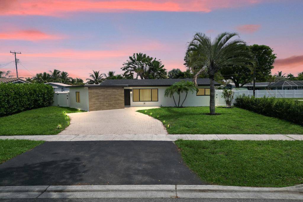 Coastal Beauty ! No expense was spared on this completely remodeled 4 Bedroom 3 Bath home in the Cove area of Deerfield Beach.