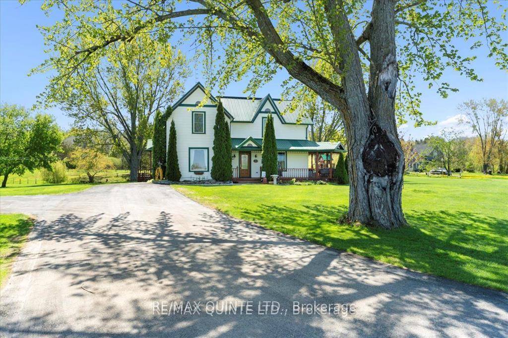 Nestled in a serene historical hamlet of Prince Edward County, this magnificent two storey country home sits on a picturesque 2.