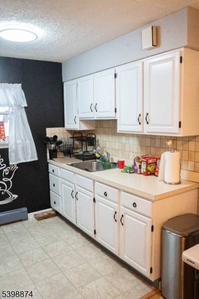 Conveniently situated near Caldwell's vibrant downtown, with easy access to shopping, dining, and NYC bound bus service.