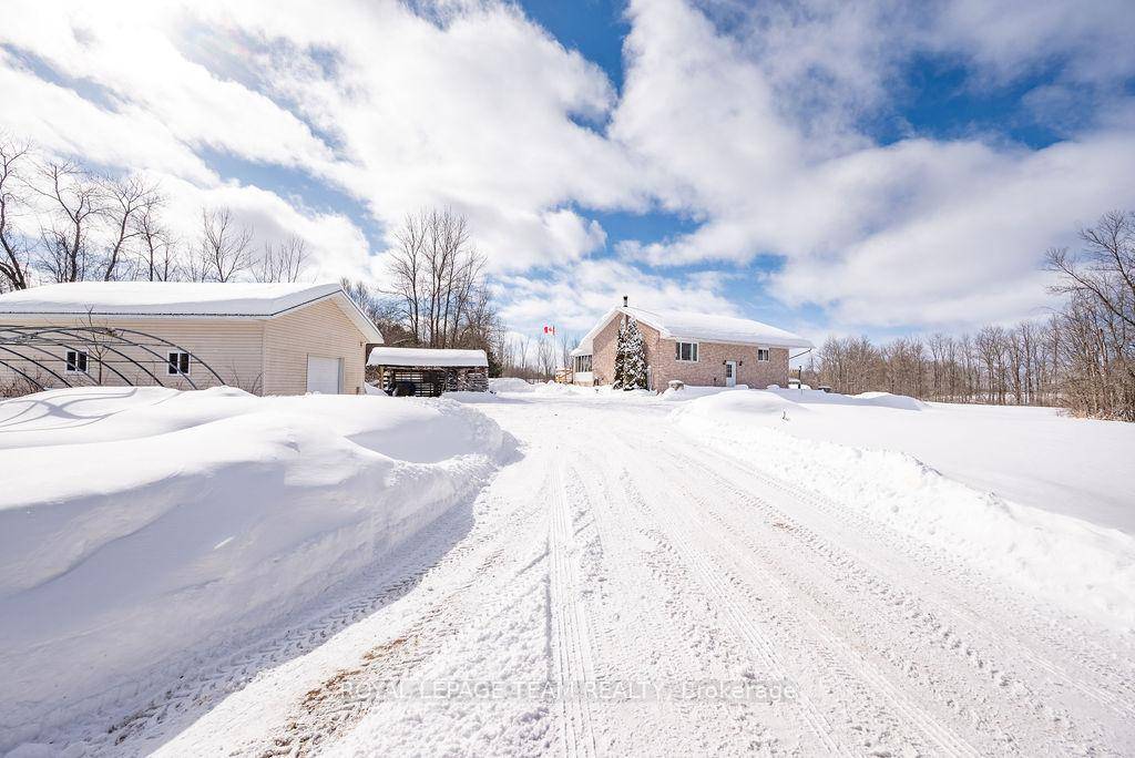 4 Bedroom 2003 built Home with a Detached Garage On TWO ACRES of Privacy !
