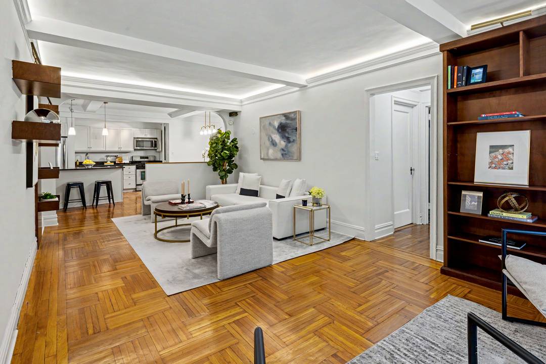 Renovated, pre war, 3 bed, 2 bath home with dining area in a full service co op, a block and a half from Central Park.