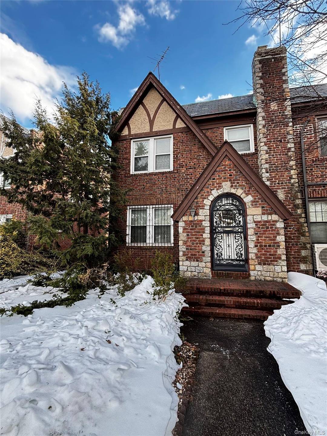 Welcome to this charming one family semi detached Tudor in the highly sought after neighborhood of Rego Park.