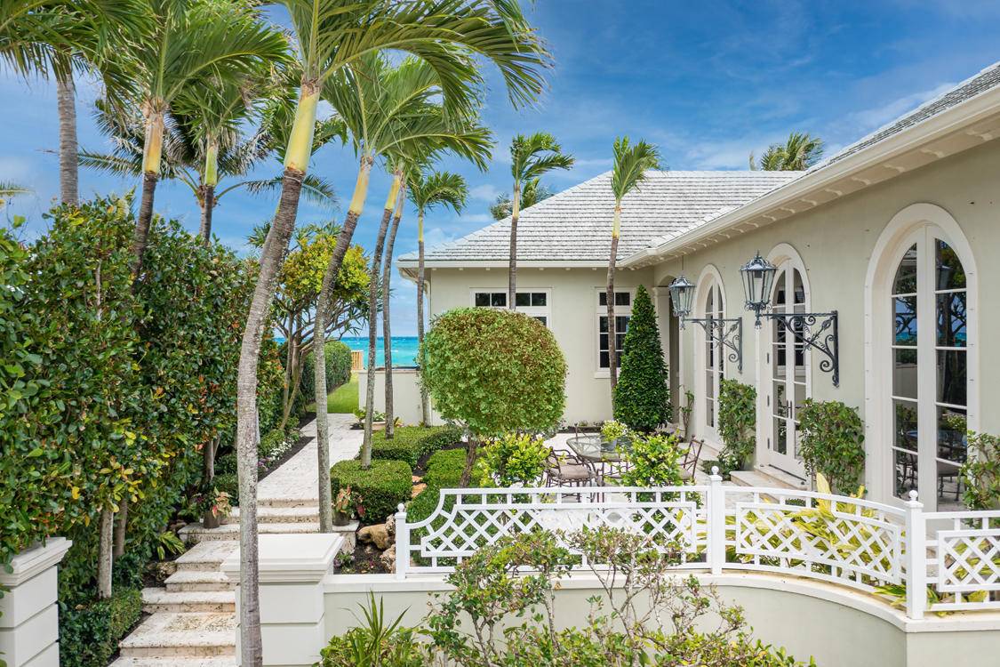 Architectural detail and endless ocean views are the hallmarks of this exceptional Mizner inspired oceanfront estate.