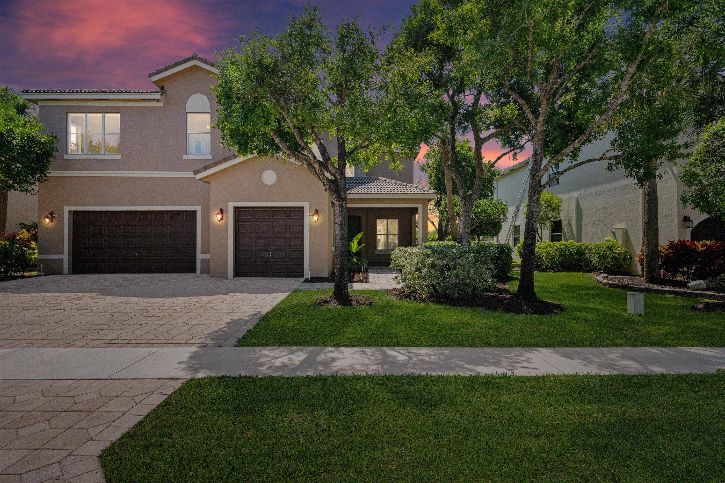 Stunning 6BD 4BA Pool Home in Gated Wellington Community with Assumable 5 VA Loan !