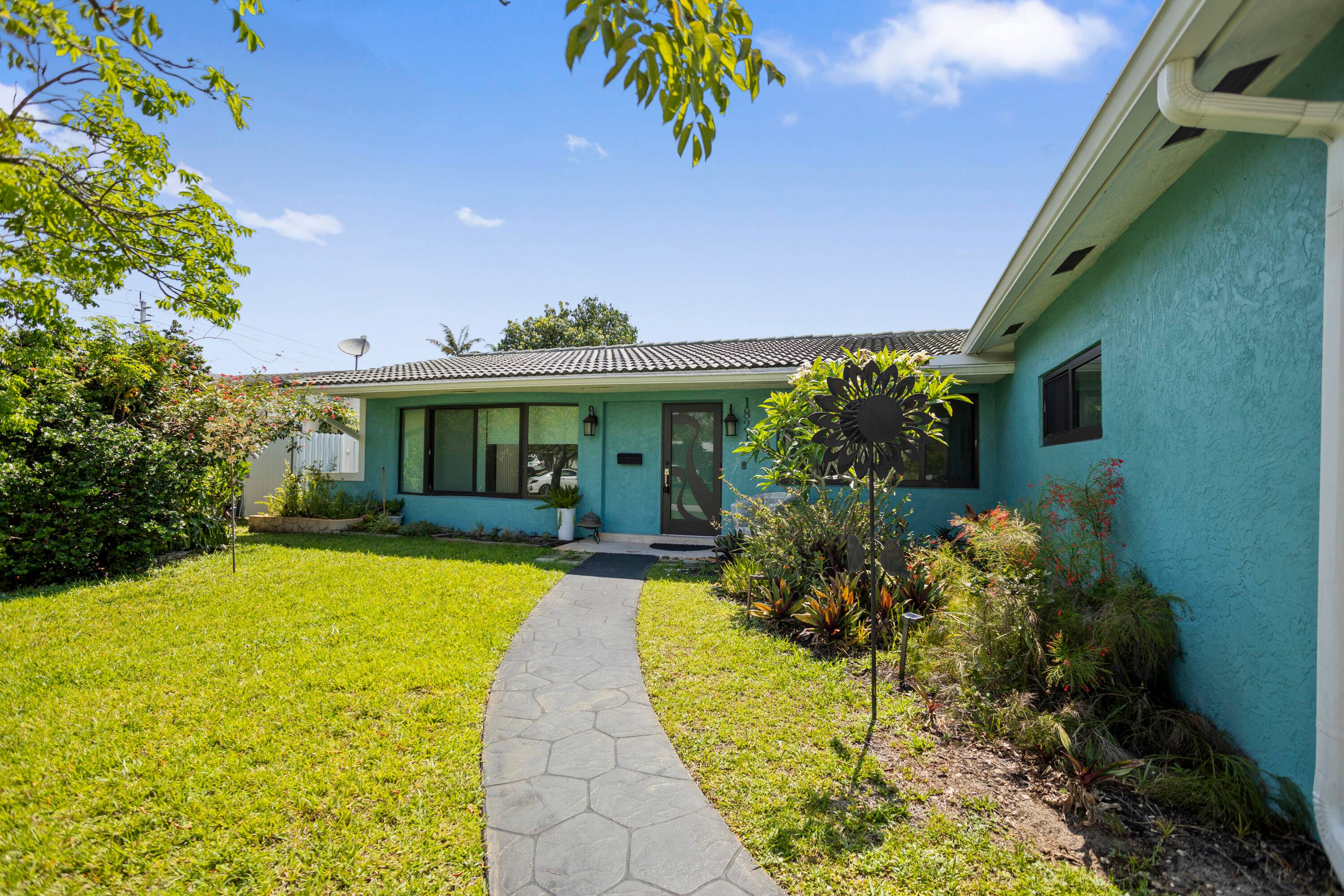 Enjoy a bit of paradise in your new heated pool and oversized yard beautifullly landscaped and private.