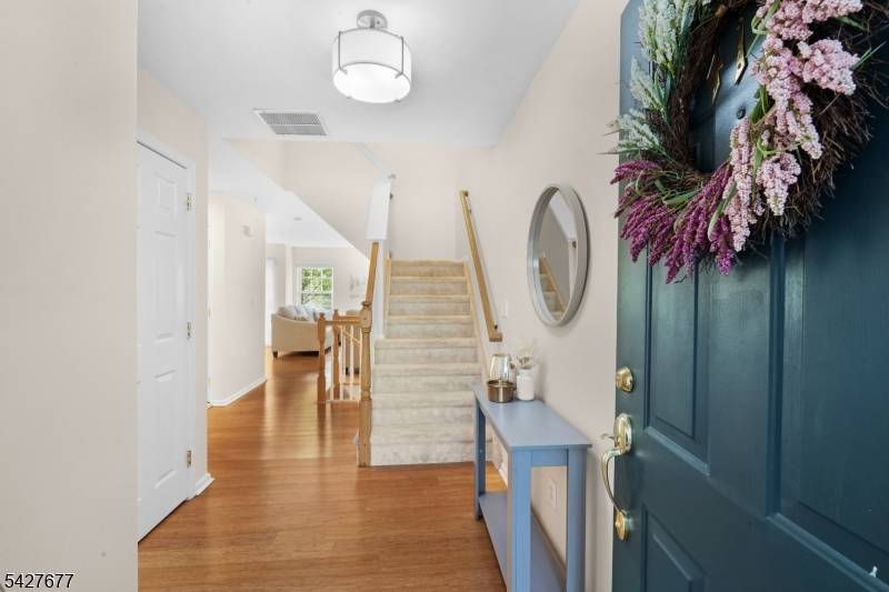 Set within a beautifully maintained townhome community in Randolph, this 2 bedroom, 2.