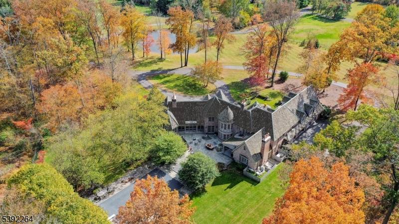 Designed by award winning NYC based architect Jeffrey Beers and featured in NJ Home magazine, this extraordinary stone manor estate is the pinnacle of refined, luxury living.