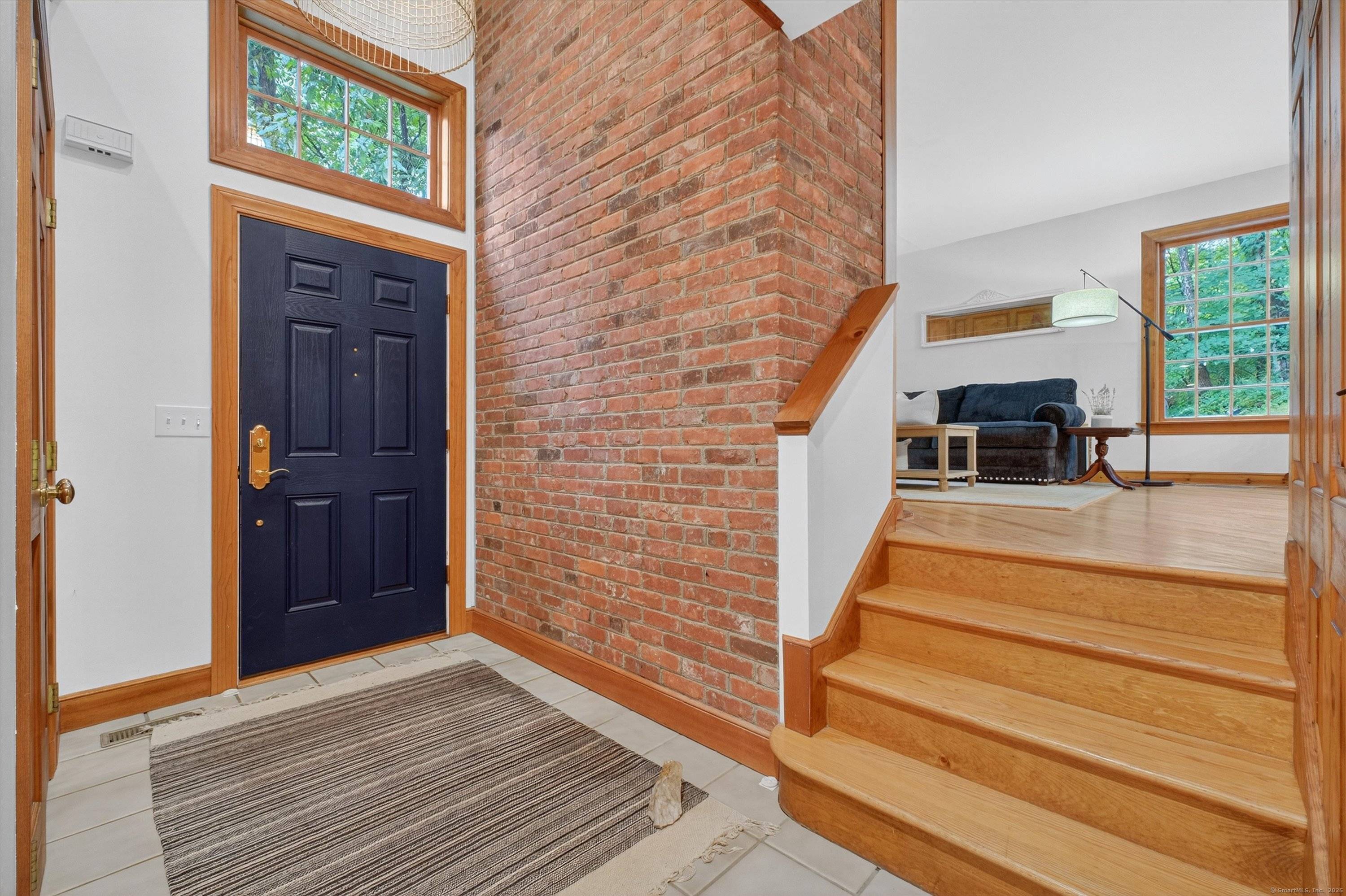 Welcome to 35 Poverty Hollow Road, an idyllic retreat nestled in southwest Newtown, with sweeping views of the scenic Red Gate Farm.