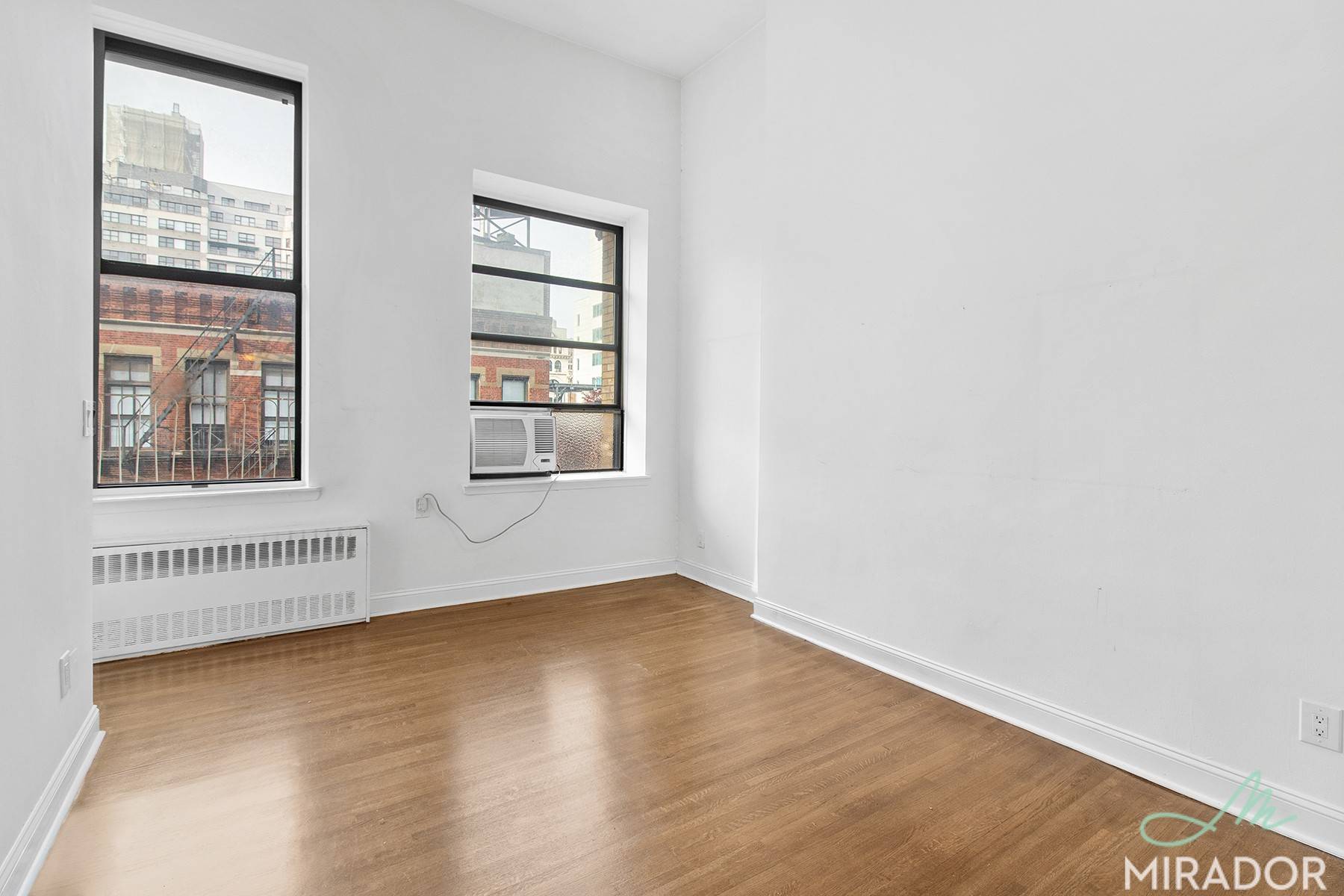 New studio with super high ceilings and over sized windows now available in a prime location !