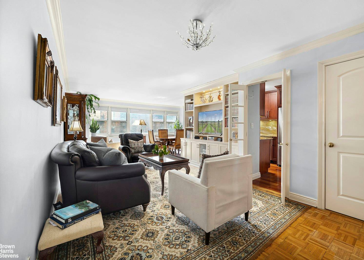 Spacious and sunny two bedroom, two bath with three exposures and tree top views.