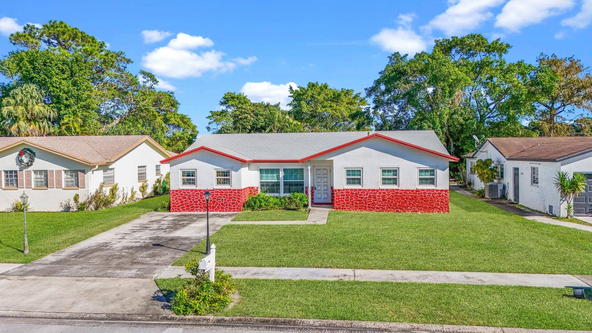 Discover this welcoming home in the sought after Sandalfoot community, offering a comfortable and convenient lifestyle without the restrictions of an HOA.