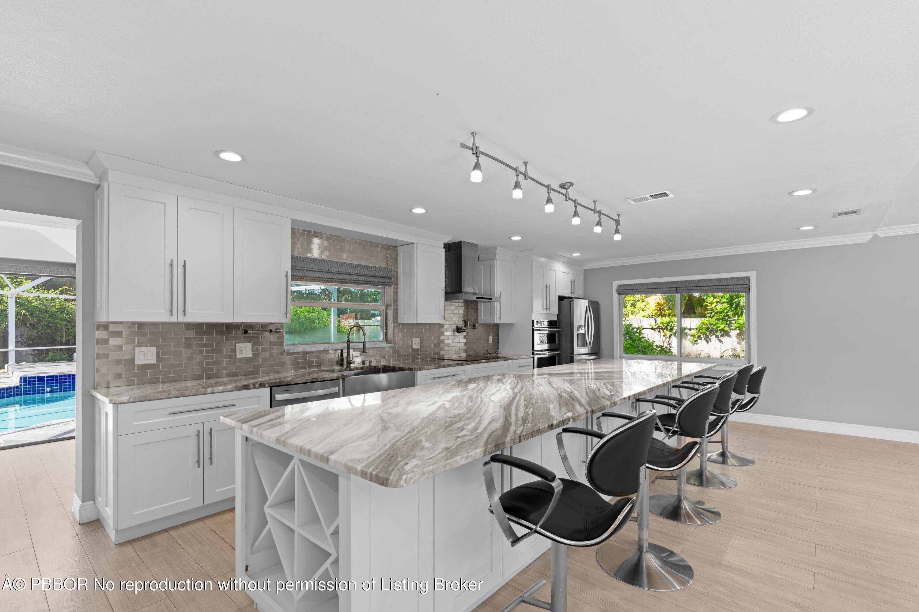Located on a quiet cul de sac in one of Wellington's most desirable neighborhoods, this renovated 4 bedroom, 2.