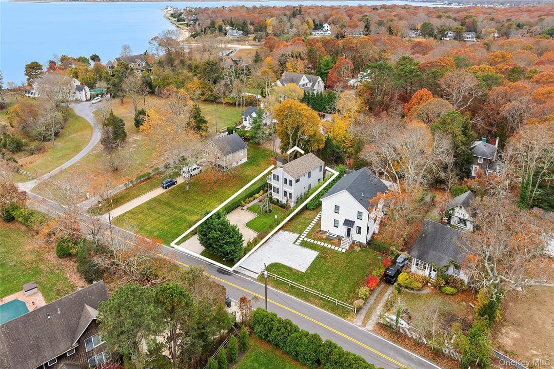 Tucked away on a quiet lane in East Quogue, this beautifully appointed multi family residence offers approximately 1, 700 square feet of refined Hamptons living.