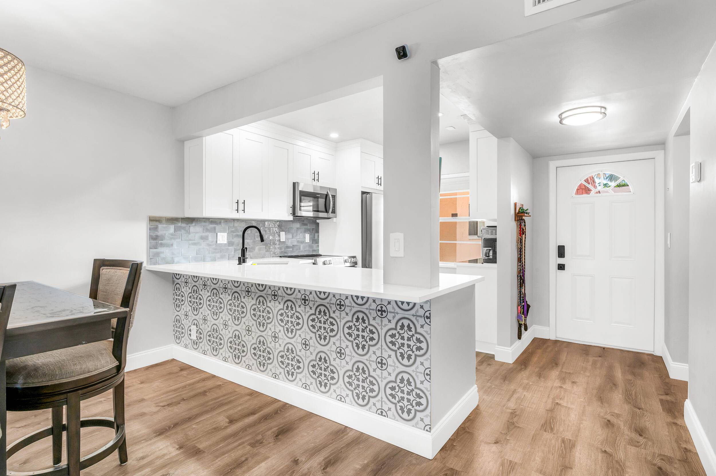 Enjoy peaceful lake views from your large covered and screened balcony in this beautifully renovated condo located in the desirable Bonaire community of the Villages of Oriole, a 55 active ...