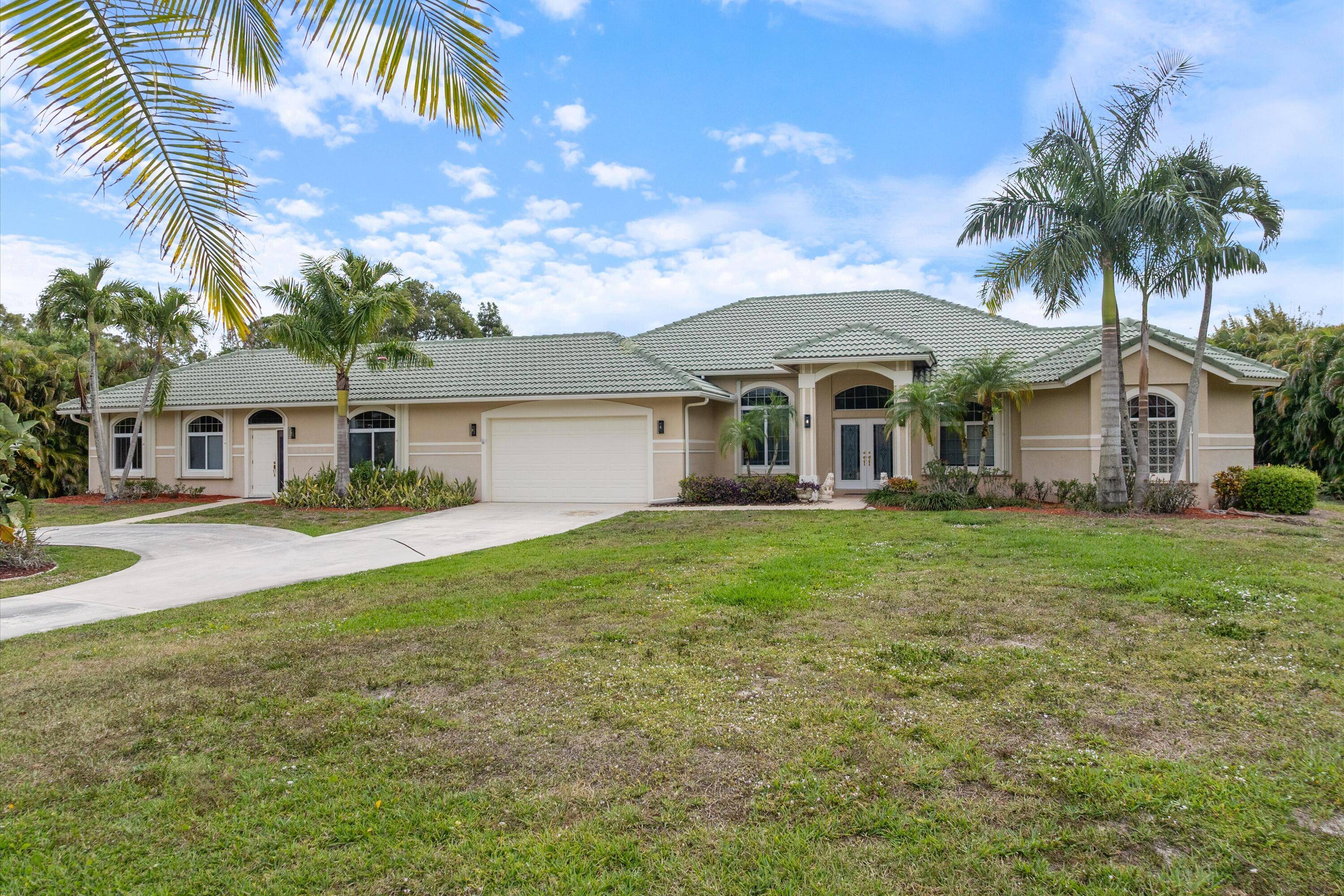 Welcome to this breathtaking estate nestled on over an acre of serene, open land offering the perfect blend of luxury, functionality, and opportunity.