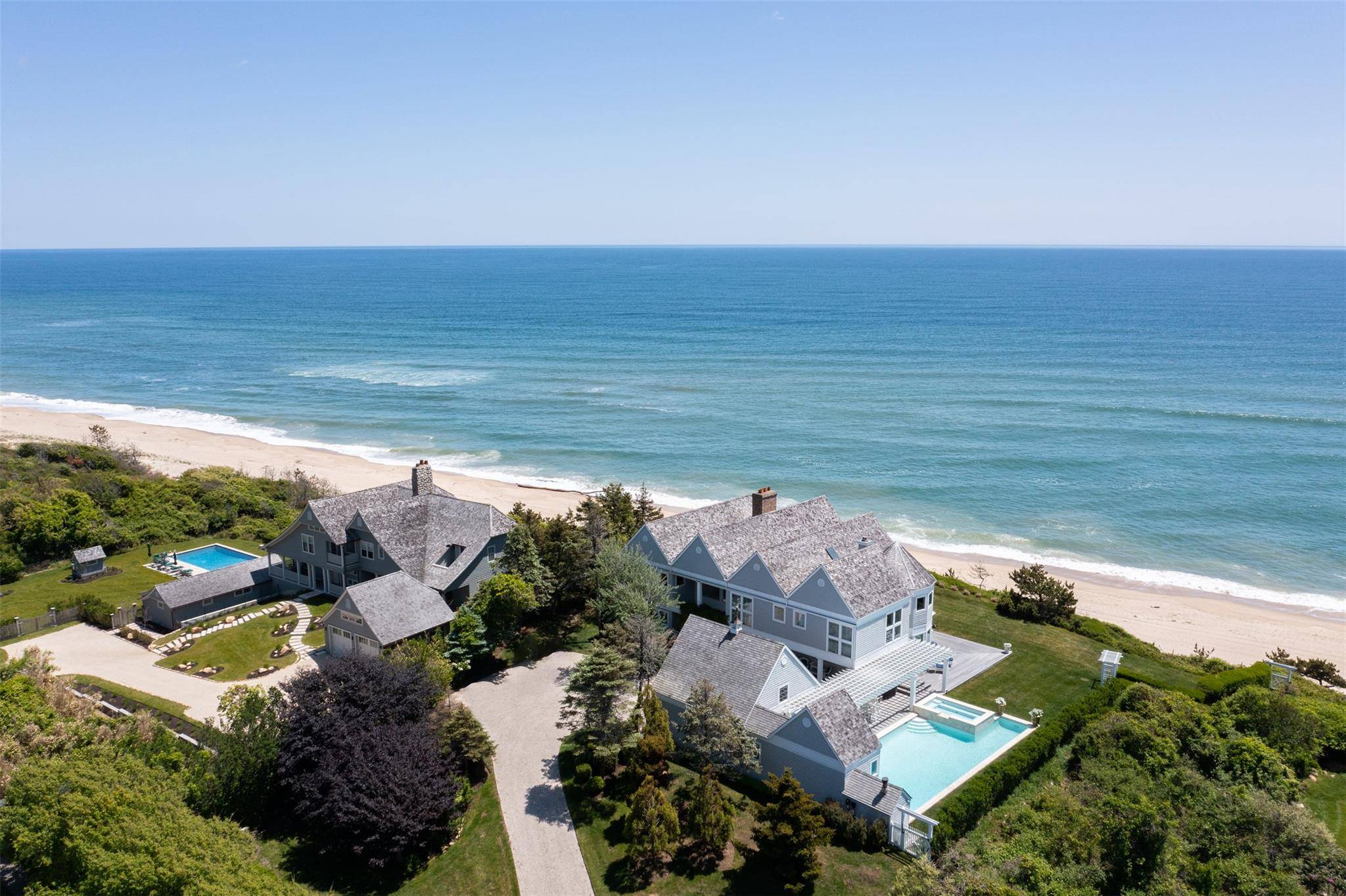 Set above the sand in Montauk, this stellar oceanfront residence takes full advantage of the high bluff with 110' of sprawling ocean frontage.