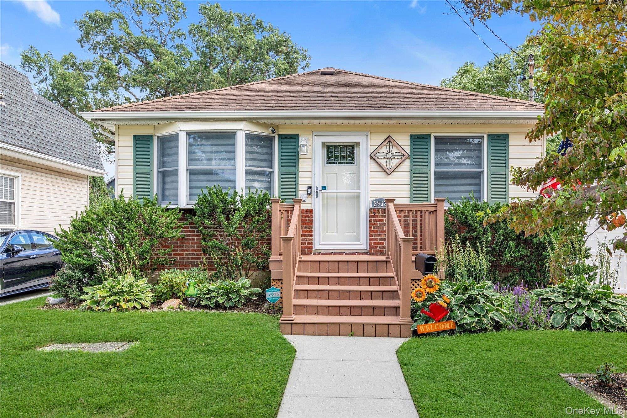 Welcome to this charming renovated Cape Cod home in the heart of Oceanside !